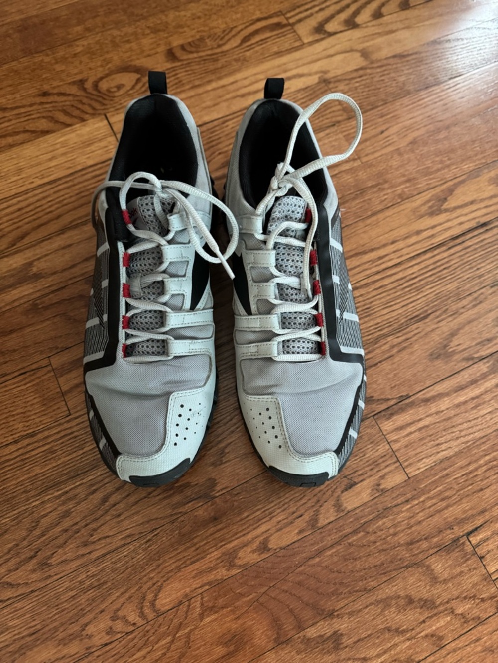 Reebok Gray and Black Athletic Sneakers with Red Accents